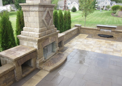 large formal outdoor gas fireplace