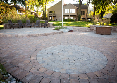 circular paver patio with contrasting colors