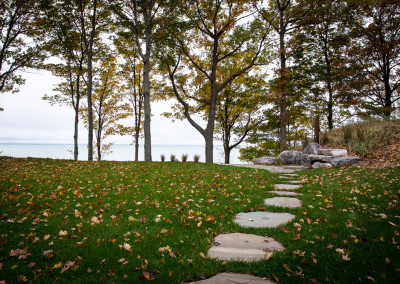 stone pathway through the grass