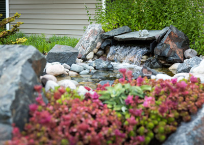 waterfall with landscape plantings