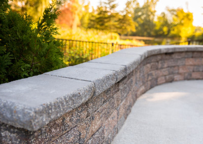 close up of brick and paver seating wall