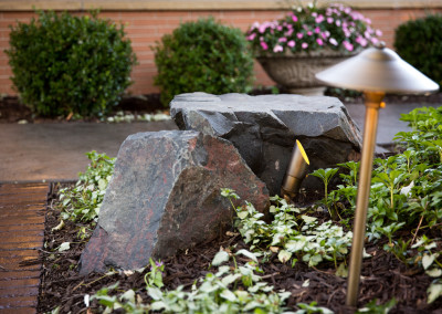 stone accents and outdoor lighting in landscaping