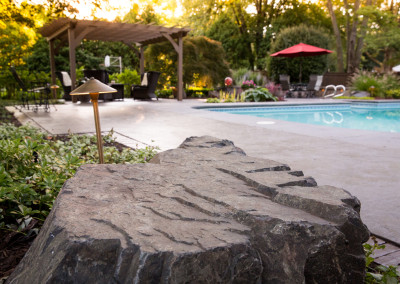 stone accents and outdoor lighting in landscaping