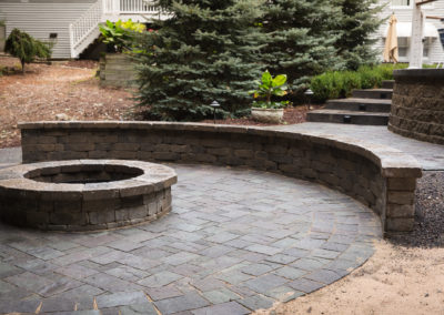 stone patio and built in firepit