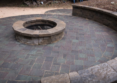 stone patio and built in firepit