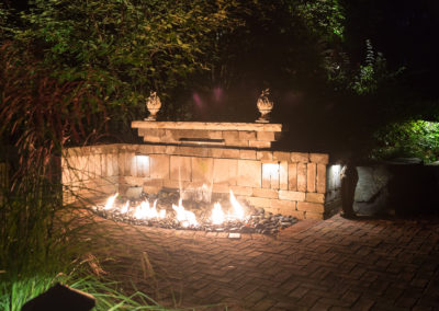 waterfall and gas fireplace by essex outdoor design