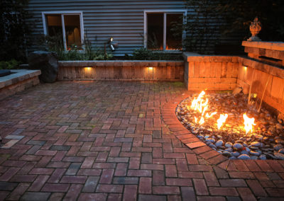 waterfall and gas fireplace by essex outdoor design