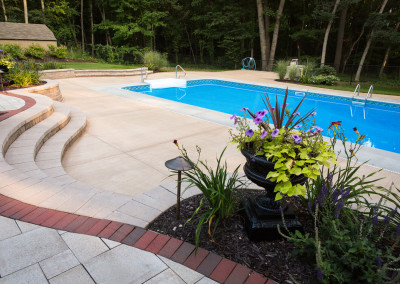 large pool patio with elevated plantings