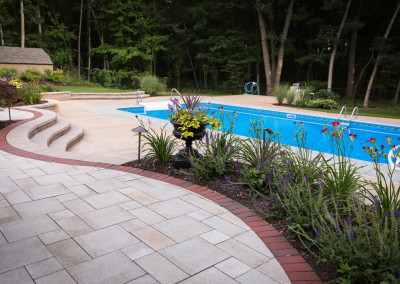 large pool patio with elevated plantings