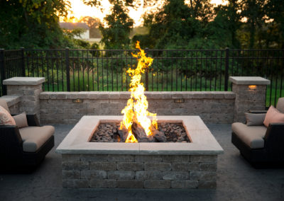 ada backyard entertaining with pool house, firepit and landscaping by essex outdoor design