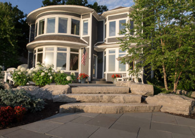 front yard patio overlooking Lake Michigan landscaped by essex outdoor design